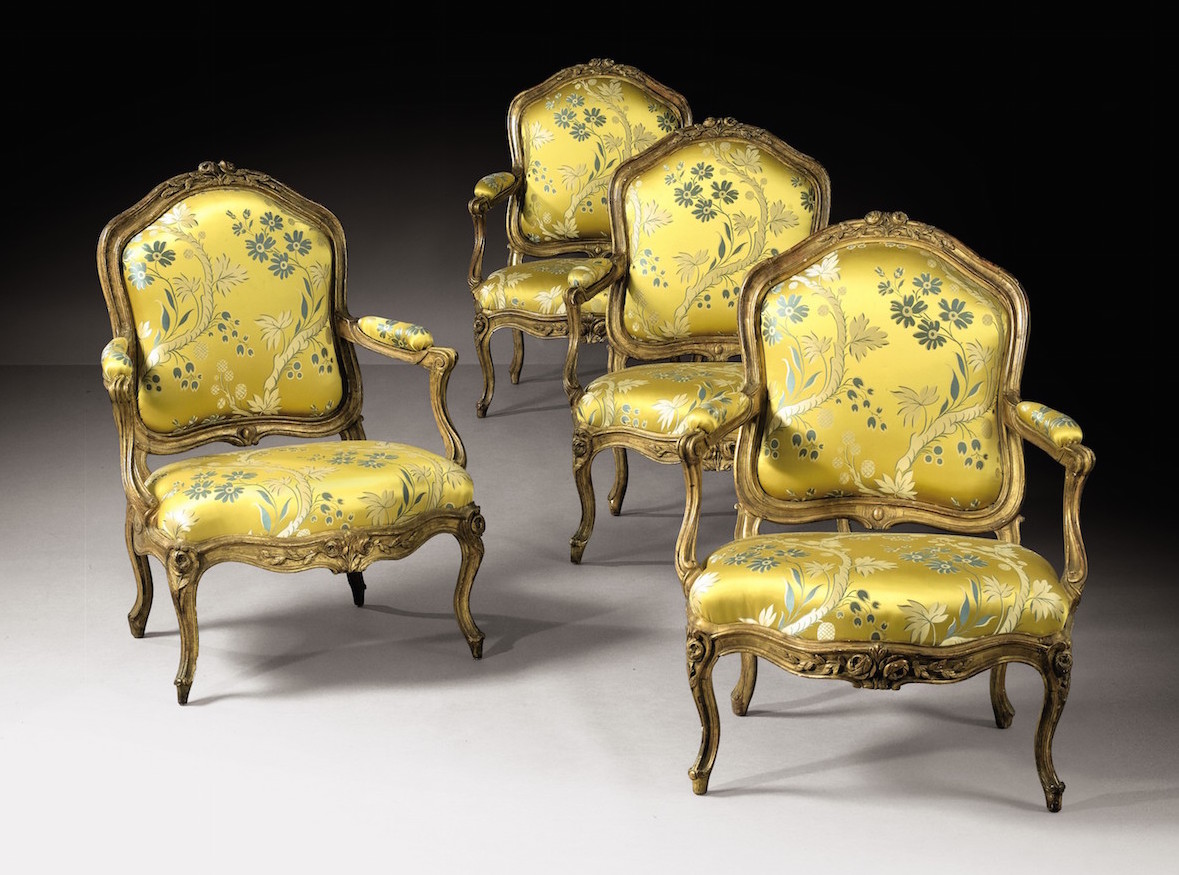 DELANOIS_A suite of four carved and giltwood fauteuils Ö la Reine